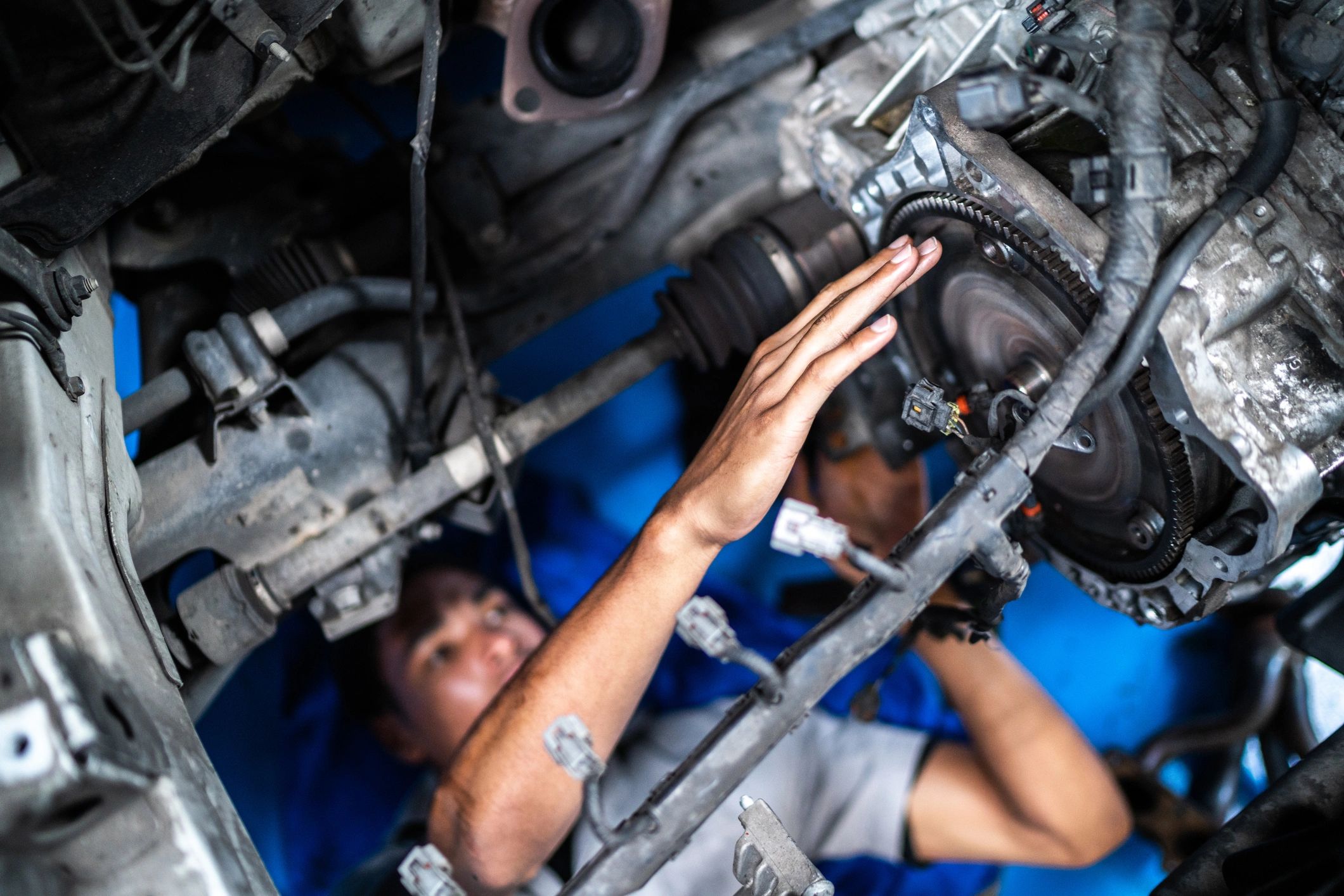 Mechanic repairing a vehicle in a professional shop
