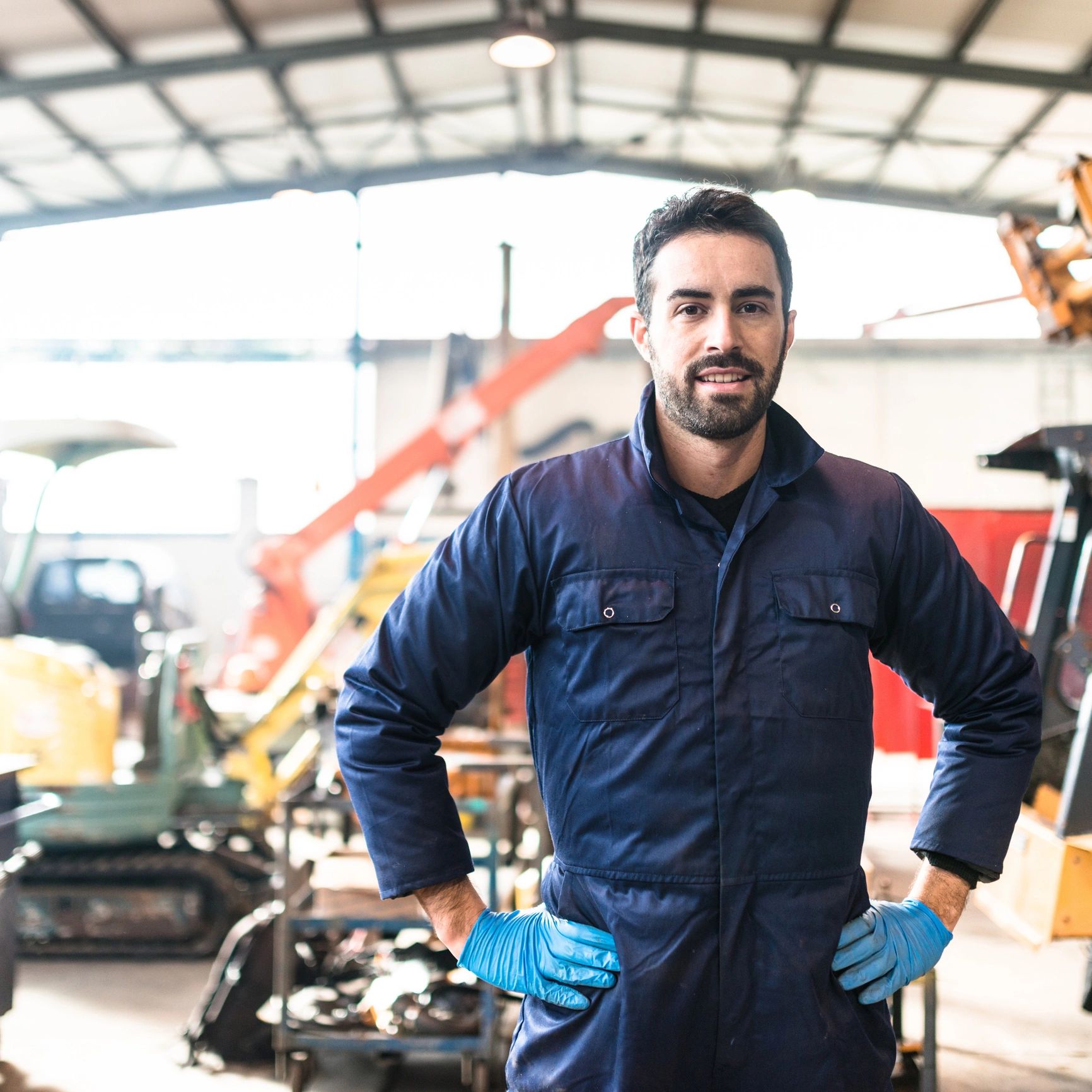 Auto technician portrait in a repair shop